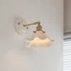 Modern LED Wall Lamp with Ceramic Shade and Copper Arm for Indoor Use