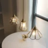 Nordic Glass LED Pendant Light with Copper Finish for Modern Spaces